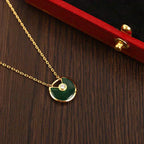 Aura AMULETTE GOLD MALACHITE NECKLACE