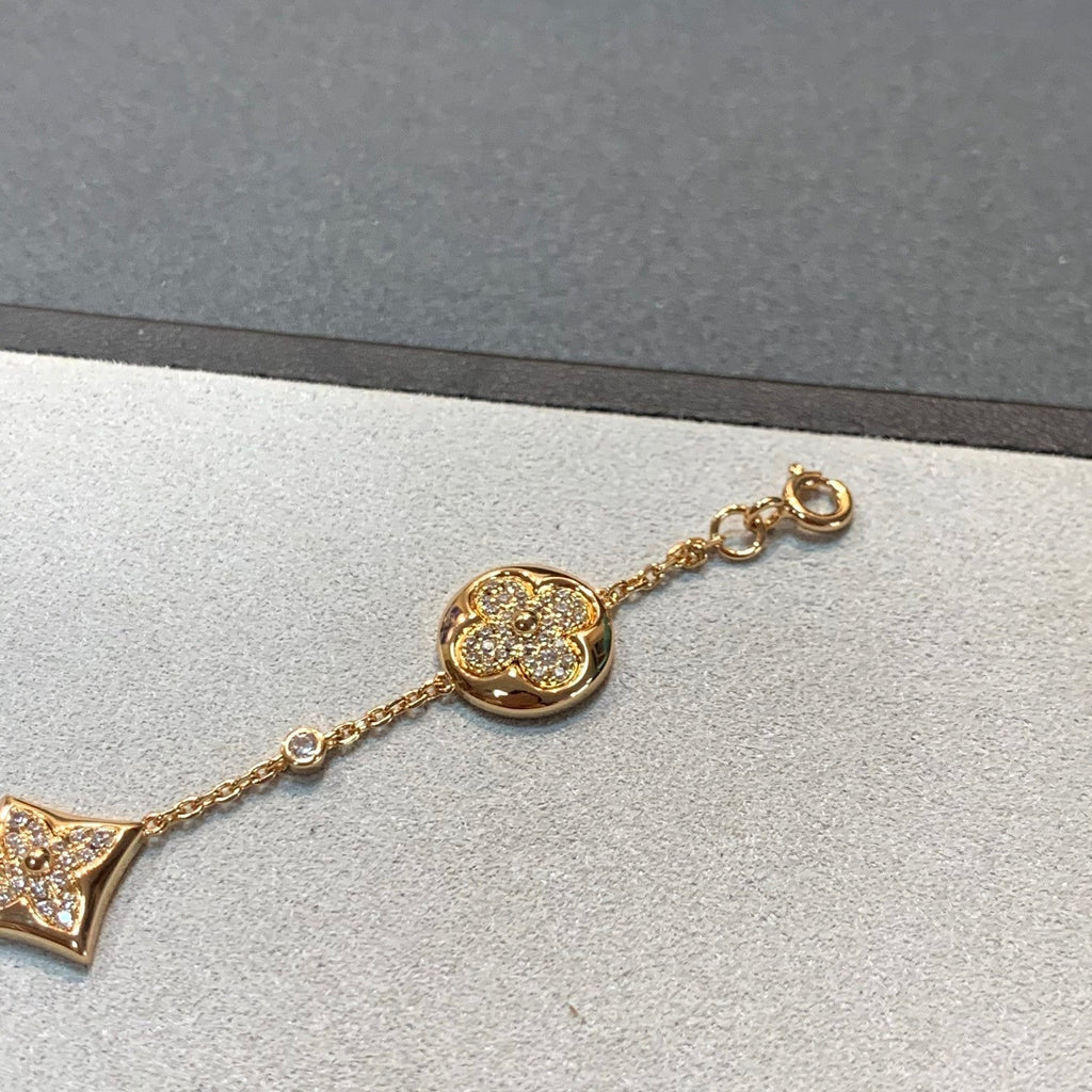 Aura STAR AND SUN 4 MOTIFS GOLD DIAMONDS BRACELET