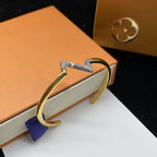 Aura VOLTE UPSITE DOWN DIAMOND GOLD OPEN BRACELET