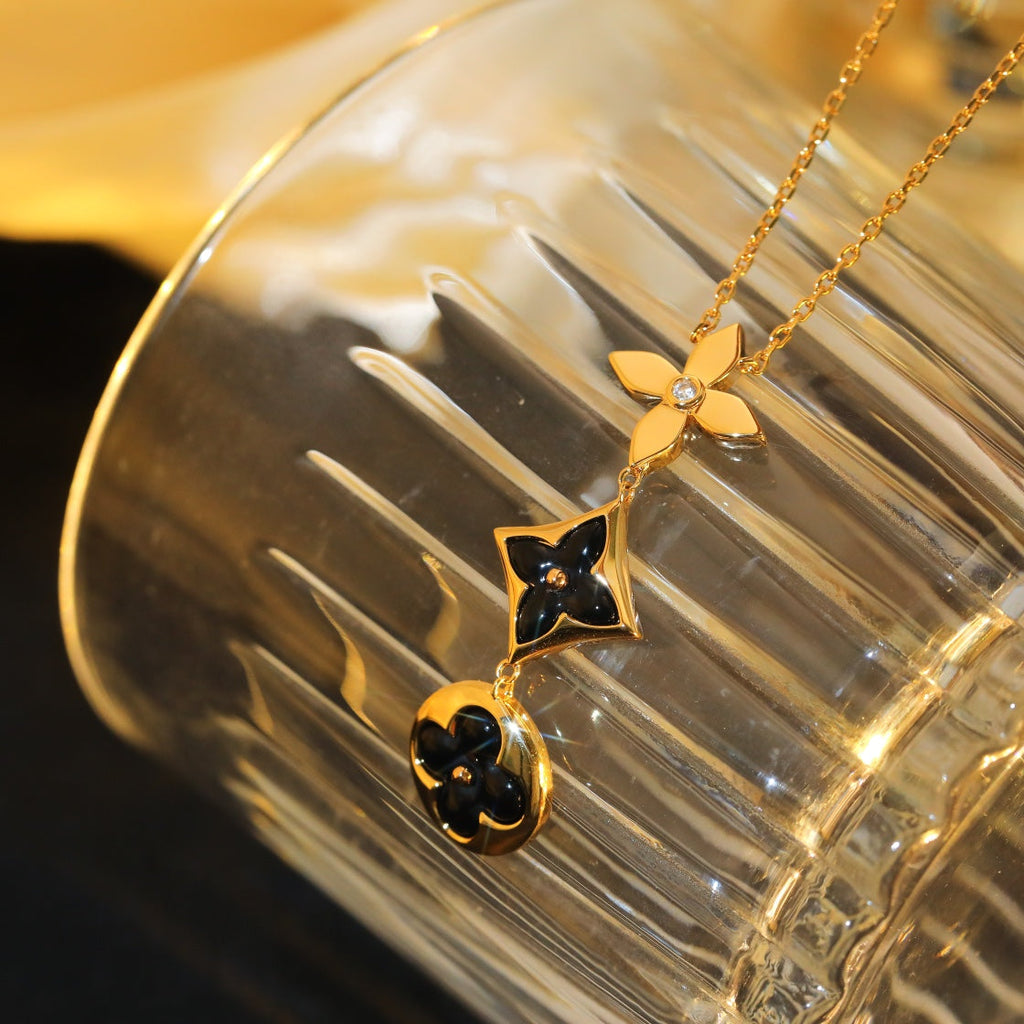 Aura STAR AND SUN ONYX ROSÉGOLD HALSKETTE