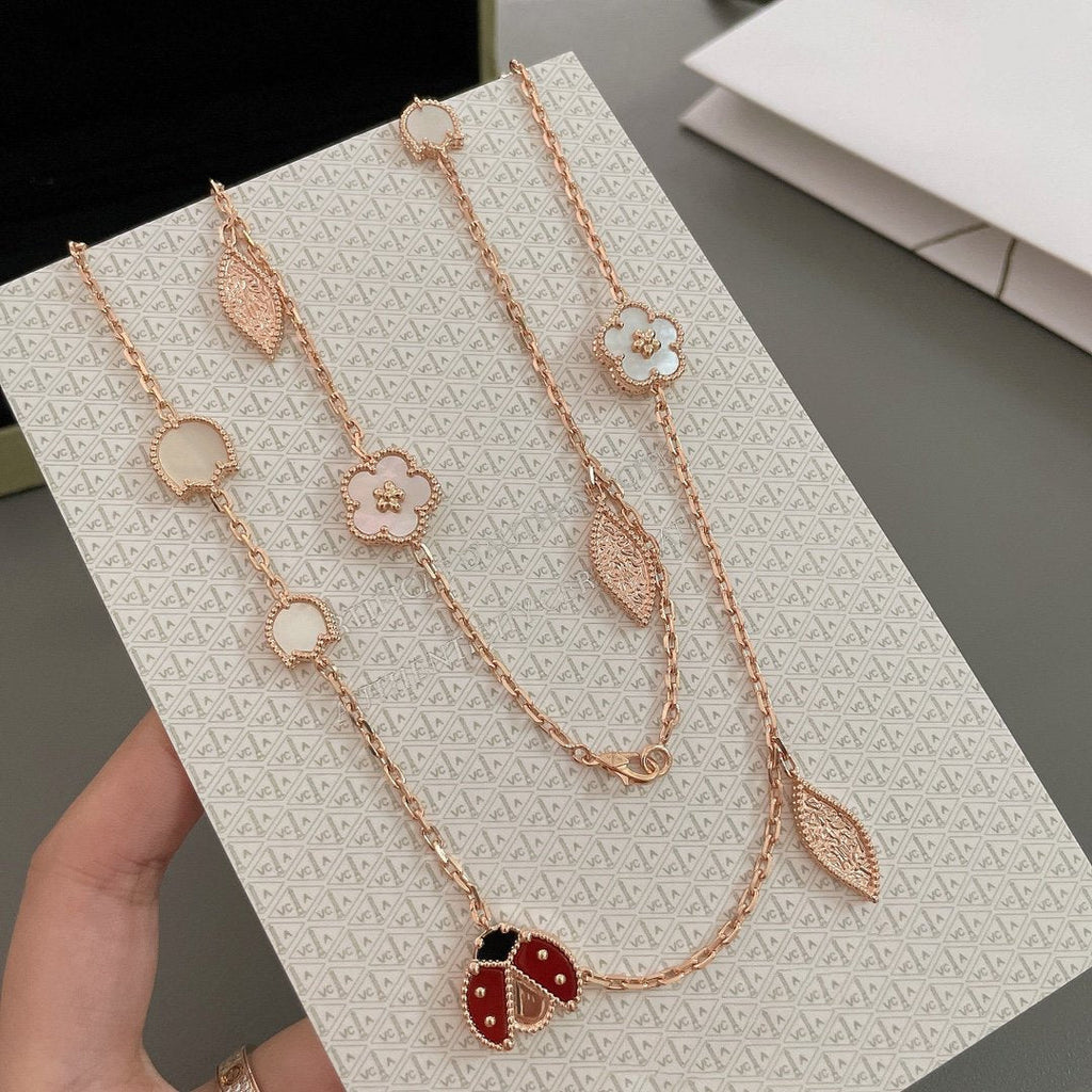 Aura LUCKY SPRING 15 MOTIFS ROSE GOLD NECKLACE