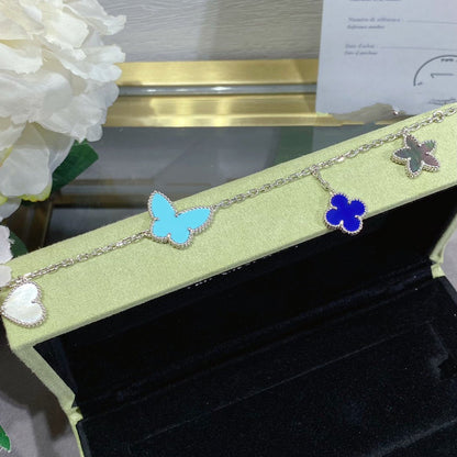Aura LUCKY SPRING SILBERARMREIF 4 MOTIVE