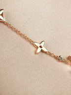 Aura STAR AND SUN 7 MOTIFS GOLD BRACELET