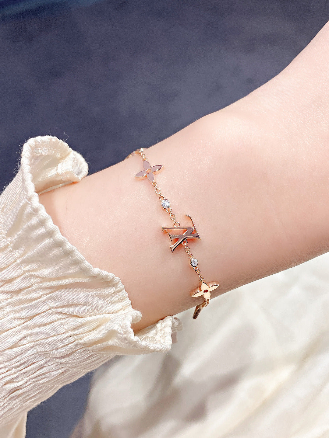 Aura STAR AND SUN 7 MOTIFS GOLD BRACELET