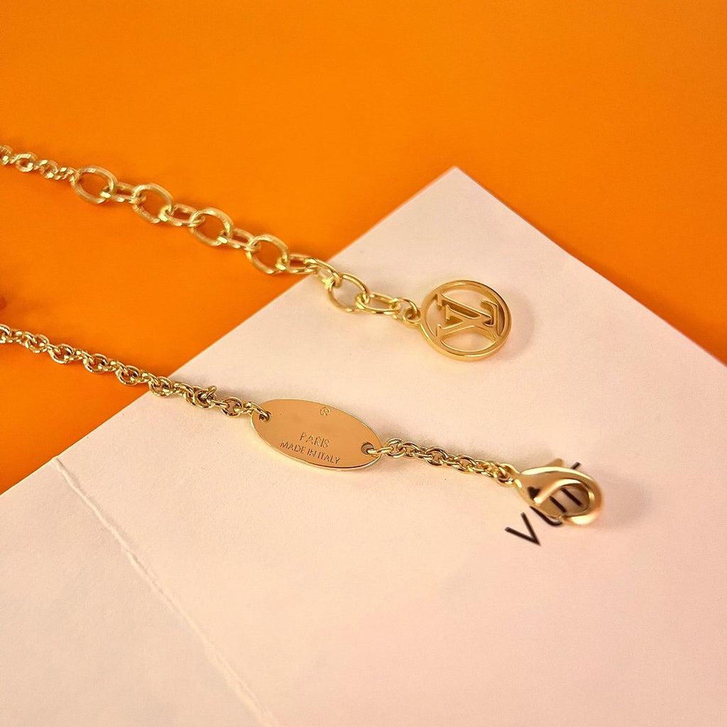 Aura LOGO STAR MOTIF GOLD BRACELET
