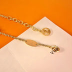 Aura LOGO STAR MOTIF GOLD BRACELET