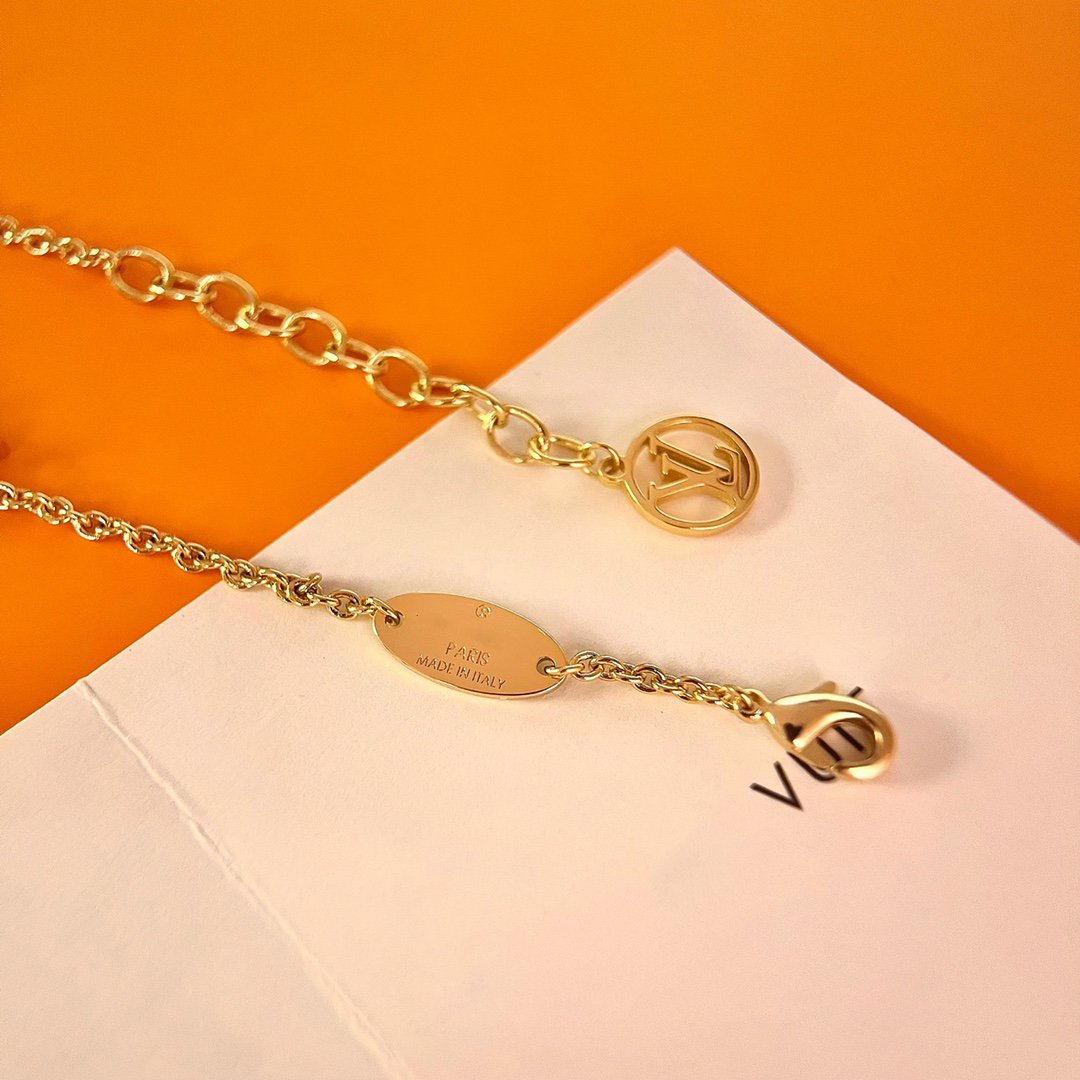Aura LOGO STAR MOTIF GOLD BRACELET