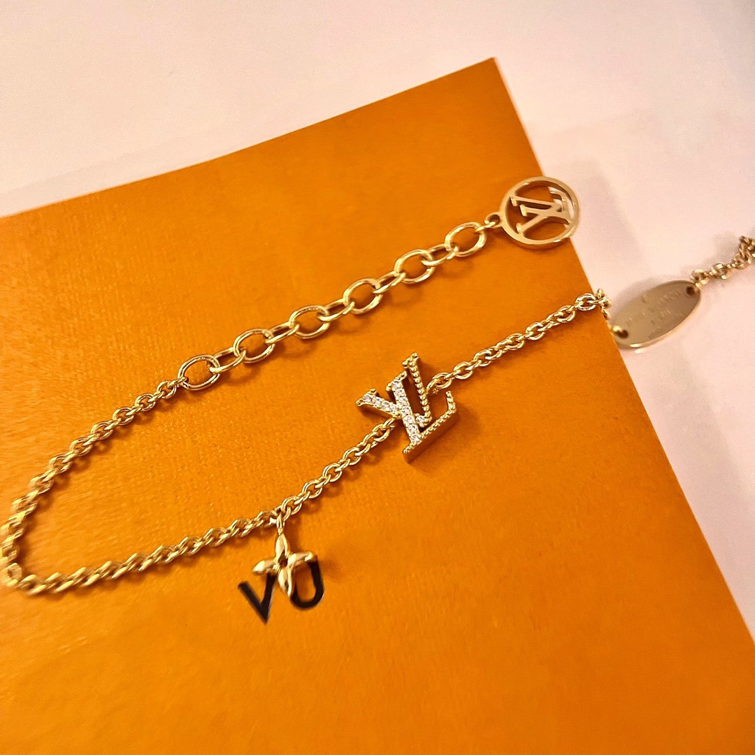 Aura LOGO STAR MOTIF GOLD BRACELET