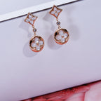 Aura STAR AND SUN PINK GOLD MOP DROP EARRINGS