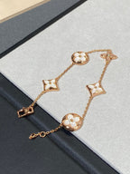 Aura STAR AND SUN 5 MOTIF MOP PINK GOLD BRACELET