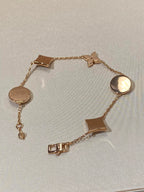 Aura STAR AND SUN 5 MOTIF MOP PINK GOLD BRACELET