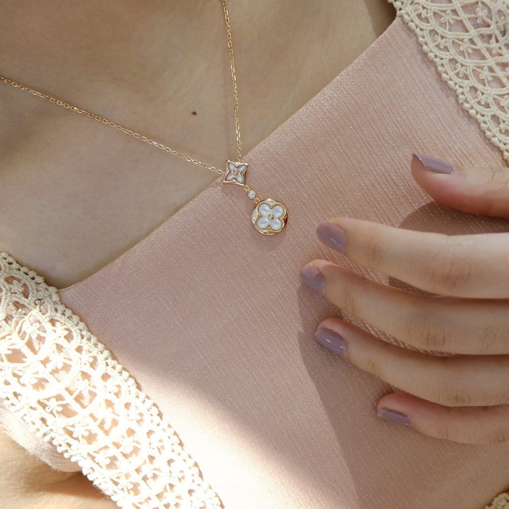 Aura STAR AND SUN WHITE MOP 2 MOTIF PINK GOLD NECKLACE