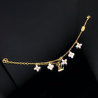 Aura LOGO 6 MOTIV STERNE UND SONNE GOLDENES ARMBAND
