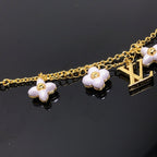 Aura LOGO 6 MOTIV STERNE UND SONNE GOLDENES ARMBAND