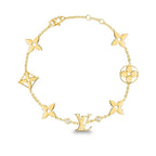 Aura STAR AND SUN 7 MOTIFS GOLD BRACELET