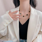 Aura CLOVER 10 MOTIFS ONYX NECKLACE