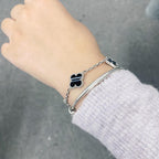 Aura CLOVER 5 MOTIV GEÄDERTER ONYX-ARMBAND SILBER