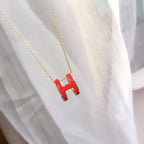 Aura HM CLIC ROTE EMAIL-GOLDHALSKETTE