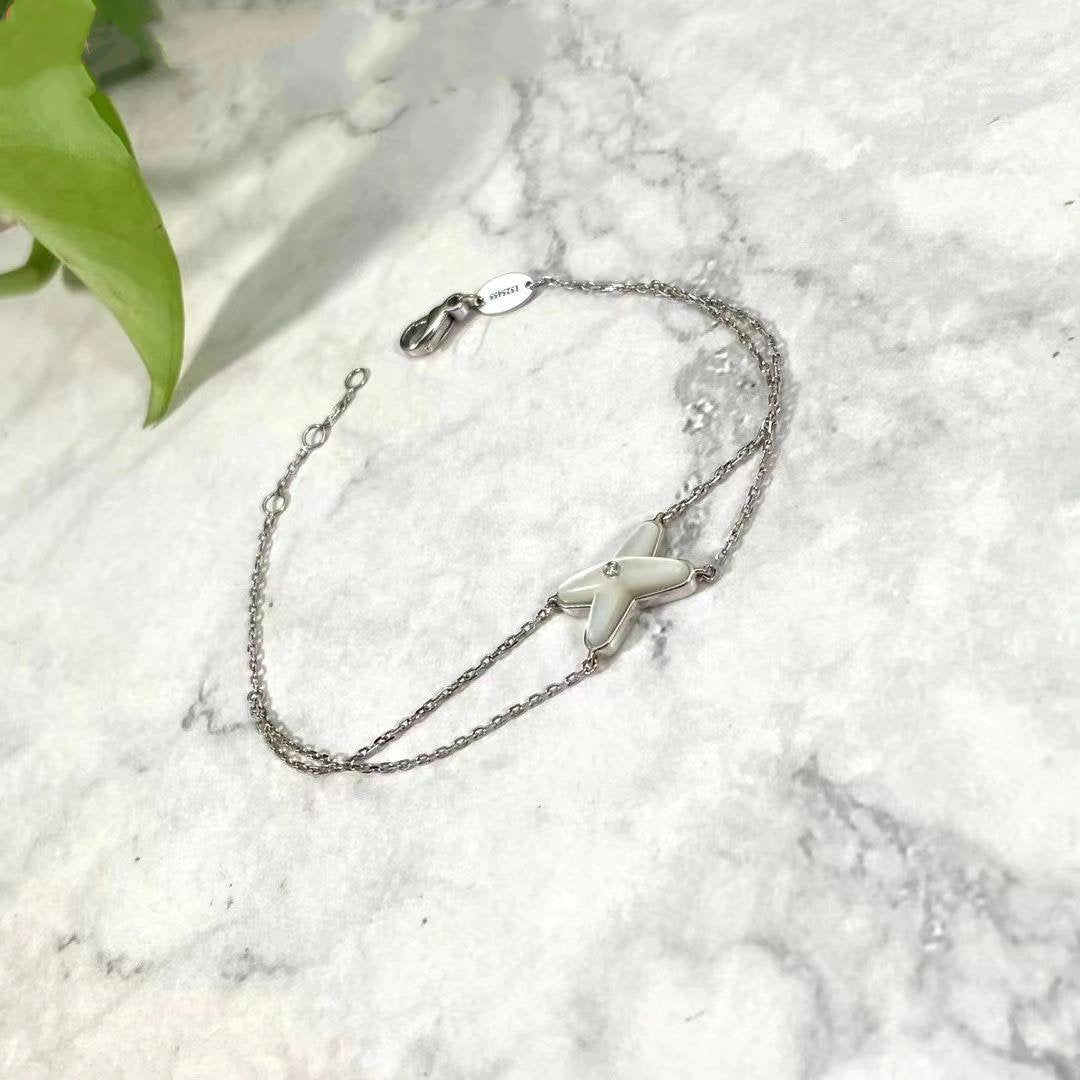 Aura JEUX ARMBAND WEISSES PERLMUTT SILBER 1 DIAMANT