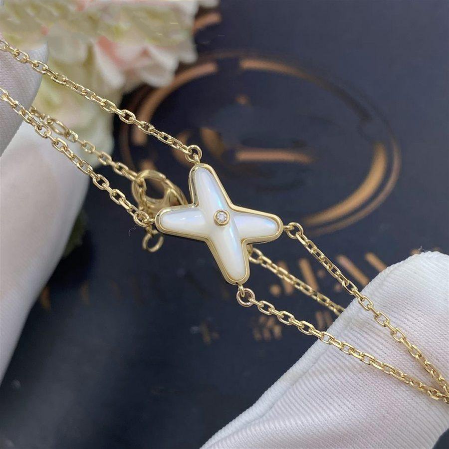 Aura JEUX ARMBAND WEISS PERLMUTT GOLD 1 DIAMANT