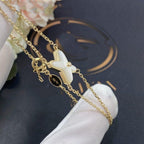 Aura JEUX ARMBAND WEISS PERLMUTT GOLD 1 DIAMANT