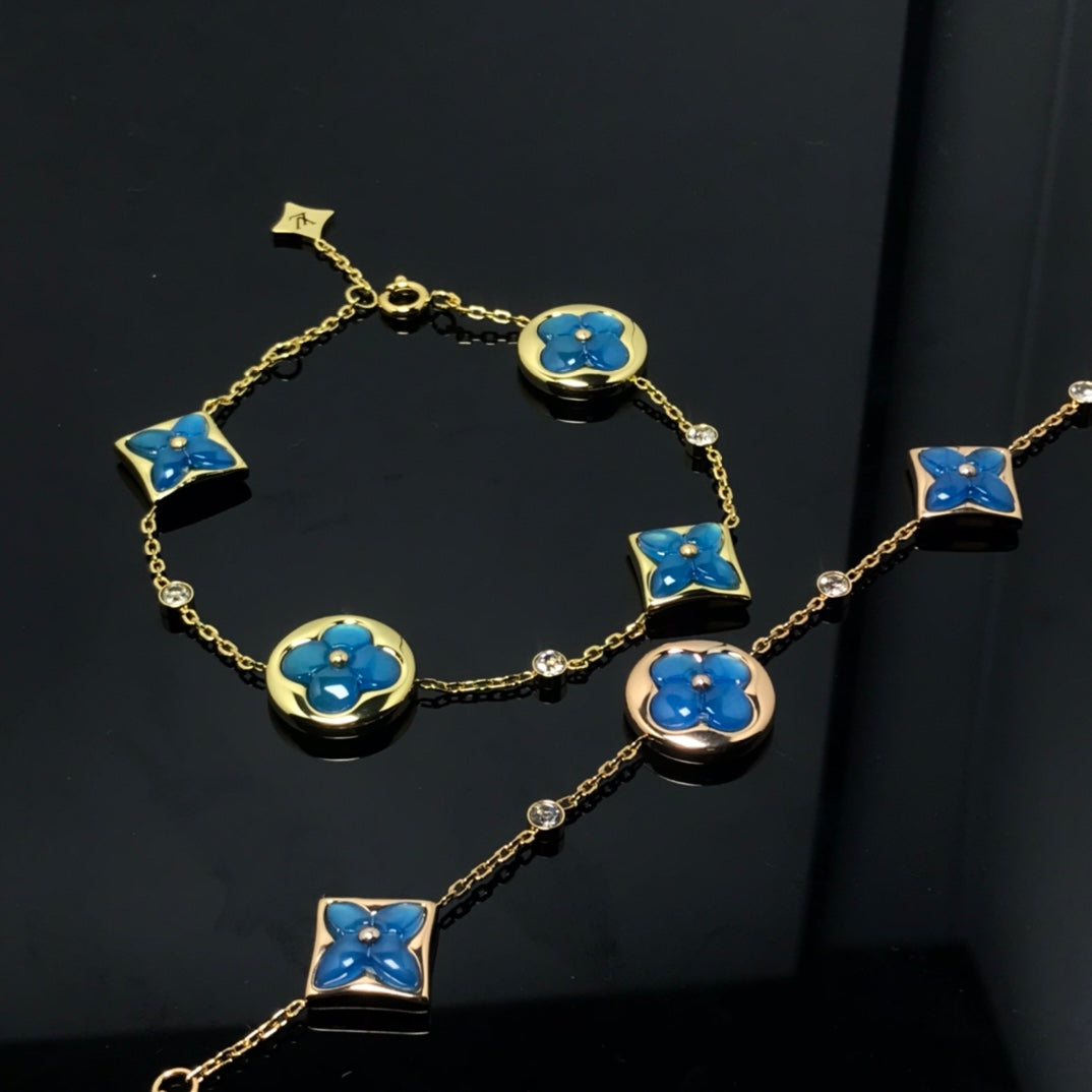 Aura STAR AND SUN 4 MOTIF BLUE BRACELET