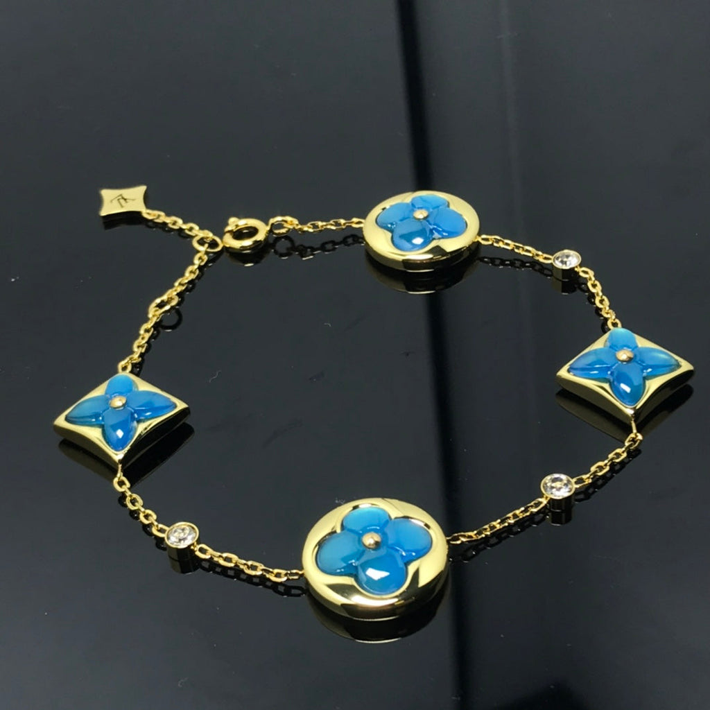 Aura STAR AND SUN 4 MOTIF BLUE BRACELET