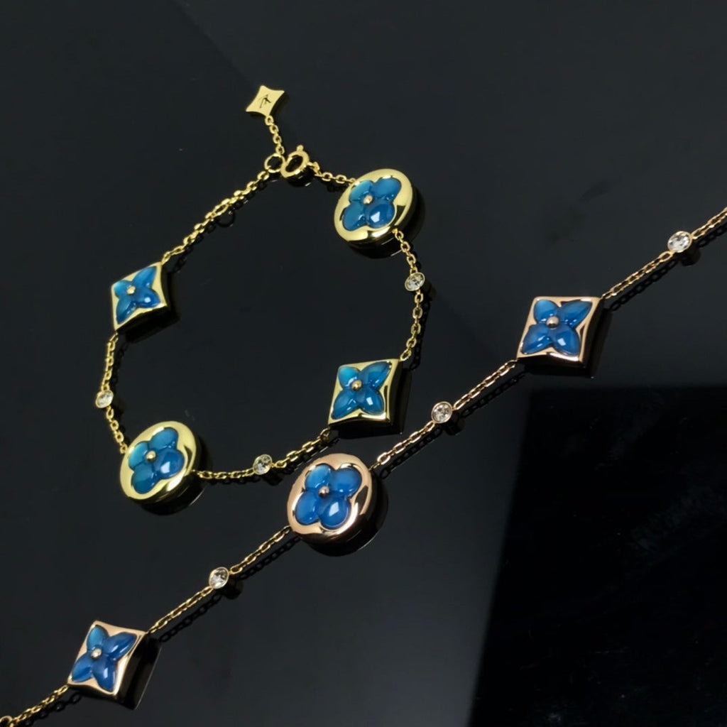 Aura STAR AND SUN 4 MOTIF BLUE BRACELET